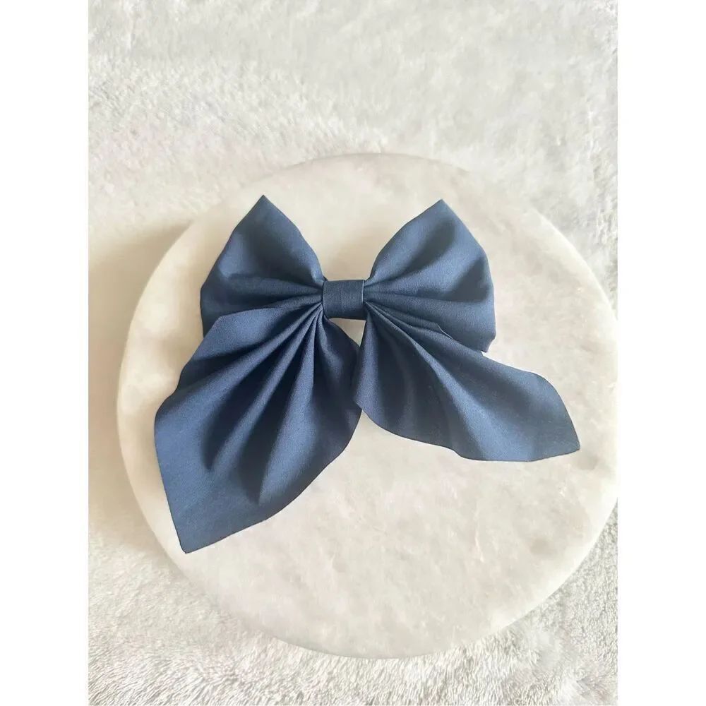Blue satin hair bow with clip